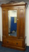 A Victorian mahogany single door wardrobe