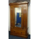 A Victorian mahogany single door wardrobe