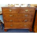 A 19th century mahogany chest of drawers, crossbanded and inlaid on bracket feet.