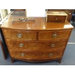 An early Victorian mahogany chest of drawers, fitted with two short and two longs drawers on splayed