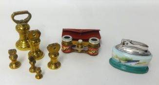 Various size brass bell weights, Minton's 'Fish' table lighter, pair of cased opera glasses