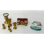 Various size brass bell weights, Minton's 'Fish' table lighter, pair of cased opera glasses