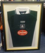 Football Memorabilia A team signed Plymouth Argyle Football Shirt, framed and glazed.