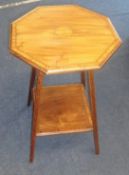 A mahogany and inlaid occasional table with lower tier.