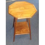 A mahogany and inlaid occasional table with lower tier.