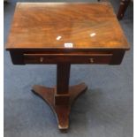 A 19th century mahogany work table on pedestal base