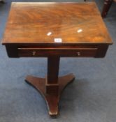 A 19th century mahogany work table on pedestal base