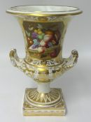 A 19th century porcelain campana urn decorated with fruits and gilt work.
