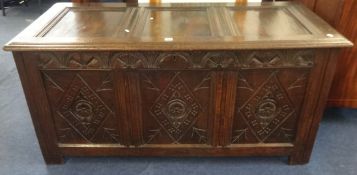 An 18th century carved oak coffer