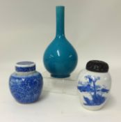 Two Chinese jars and a turquoise glazed bottle vase Probably 19th century, 25cm height