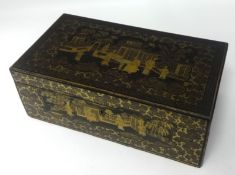 A Chinese lacquer and gilt decorated writing slope 19th century, 14cm height and 38cm width