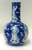 A large Chinese bottle vase decorated with the Eight Immortals 19th century, 39cm height