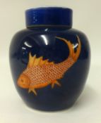 A Chinese powder blue jar with fish decoration 19th century, 16cm height