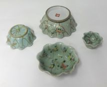 Four Chinese Celadon ground bowls 19th century, 21cm diameter