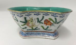 A Chinese Ingot shaped bowl 19th century, 17cm width