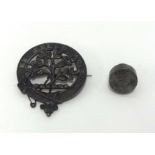 A Scottish white metal kilt brooch 'EX BELLO QUIES' and a small seal (2).