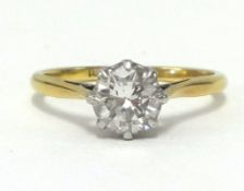 An 18ct diamond solitaire ring, approx 0.75 carat, finger size M.