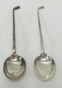 Two silver tea spoons, modelled in the form of golf clubs, 20gms