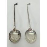 Two silver tea spoons, modelled in the form of golf clubs, 20gms