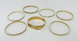 Six 9ct gold bangles, approx 58.50gms.