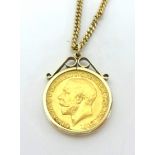 A Geo. V 1913 gold sovereign mounted as a pendant on 9ct gold chain.