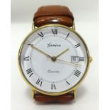 Genève Quartz, a gents gold plated date wristwatch.