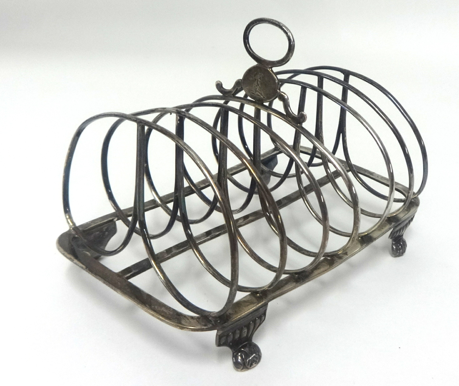 A Georgian six division toast rack, 'RE & EB', approx 7.80oz.