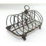 A Georgian six division toast rack, 'RE & EB', approx 7.80oz.