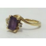 A 9ct amethyst and diamond set ring, finger size M.