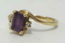 A 9ct amethyst and diamond set ring, finger size M.