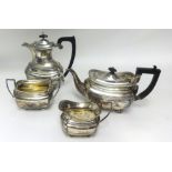 An Edwardian four piece silver tea service, approx 60oz (a set of three plus one).