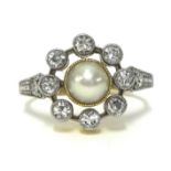 A diamond cluster and pearl set ring, set with old cut diamonds, finger size Q