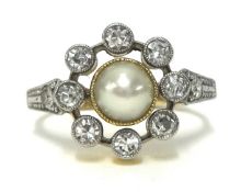 A diamond cluster and pearl set ring, set with old cut diamonds, finger size Q