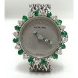 Bueche Girod, a ladies white gold diamond and emerald set Swiss cocktail wristwatch.