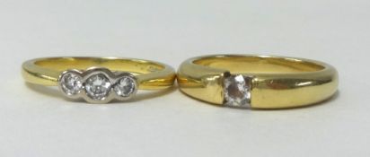 Two diamond set yellow gold rings, finger size N, 8.30gms.
