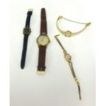 Dunhill, a ladies wristwatch and three others.