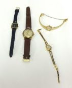Dunhill, a ladies wristwatch and three others.
