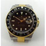 Rolex, a fine gents steel and gold GMT Master II wristwatch with original box, papers warranty dated