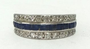 A diamond, sapphire and ruby band ring, ringer size O.
