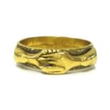 A rare Georgian yellow metal double loop hand ring (no markings), ring size N.