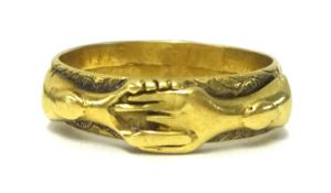 A rare Georgian yellow metal double loop hand ring (no markings), ring size N.