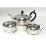 A Geo V three piece silver tea service, approx 21.60oz.