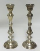 A pair silver candlesticks, height 27cm.