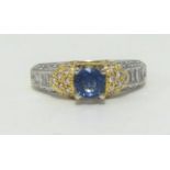 An 18ct diamond and sapphire ring, finger size O