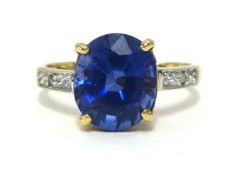 A tanzanite single stone ring, set in yellow gold, finger size L.