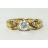 An 18ct diamond set ring, approx 0.50 carat, finger size Q, weight 5.50gms.