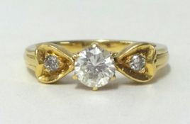An 18ct diamond set ring, approx 0.50 carat, finger size Q, weight 5.50gms.