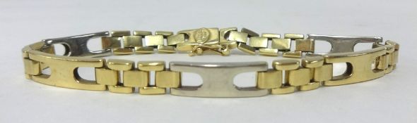 A 14ct yellow and white gold bracelet, approx 20gms.