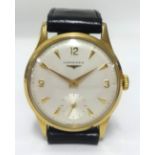 Longines, a gents 9ct gold traditional wristwatch with sub second dial.