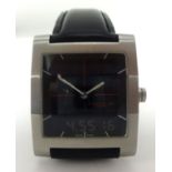 Dunhill, a gents DM7 stainless steel Analog/Digital wristwatch, with original box.